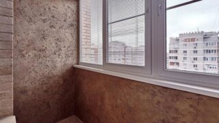 Отделка балкона штукатуркой